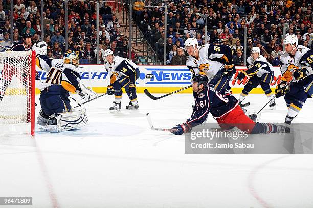 Goaltender Patrick Lalime is unable to stop the shot from a diving Rick Nash of the Columbus Blue Jackets during the second period on February 6,...