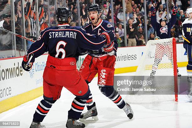 Rick Nash celebrates his goal with teammate Anton Stralman, both of the Columbus Blue Jackets, during the second period against the Buffalo Sabres on...