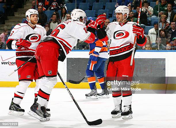 Patrick Dwyer of the Carolina Hurricanes celebrates his second period goal with teammate Brandon Sutter in a game against the New York Islanders on...