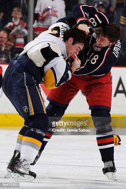 Umberger of the Columbus Blue Jackets fights with Drew Stafford of the Buffalo Sabres during the third period on February 6, 2010 at Nationwide Arena...