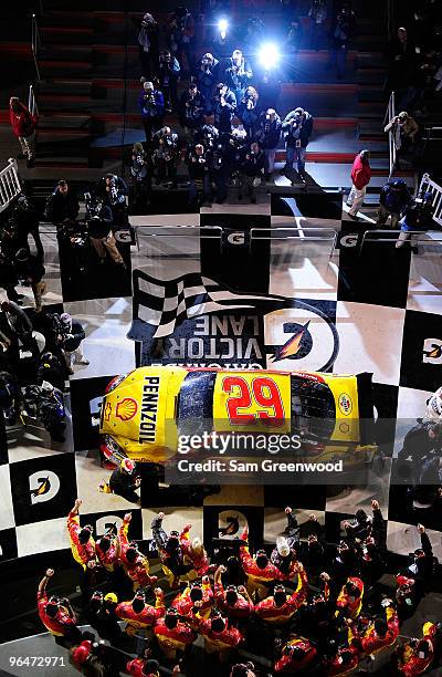 Kevin Harvick, driver of the Shell/Pennzoil Chevrolet, celebrates winning the Budweiser Shootout at Daytona International Speedway on February 6,...