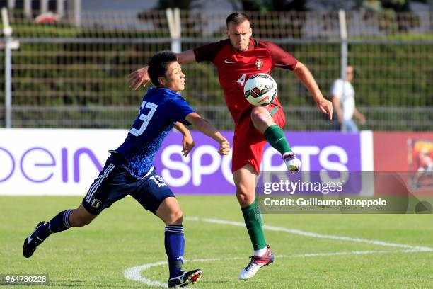 Ayase Ueda of Japan and Luis Silva of Portugal during U20 match between Portugal and Japan of the International Football Festival tournament of...