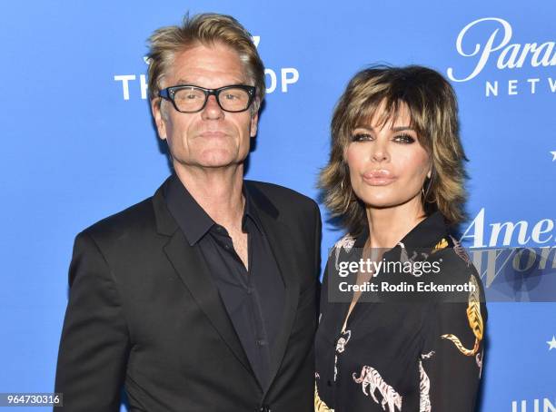 Harry Hamlin and Lisa Rinna attend the premiere of Paramount Network's "American Woman" at Chateau Marmont on May 31, 2018 in Los Angeles, California.