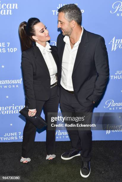 Kyle Richards and Mauricio Umansky attend the premiere of Paramount Network's "American Woman" at Chateau Marmont on May 31, 2018 in Los Angeles,...