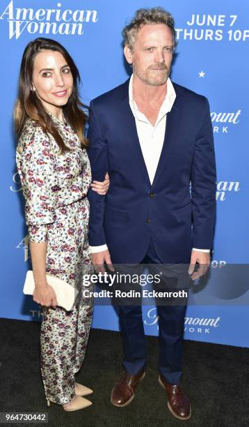 Rachel Ramras and Hugh Davidson attend the premiere of Paramount Network's "American Woman" at Chateau Marmont on May 31, 2018 in Los Angeles,...