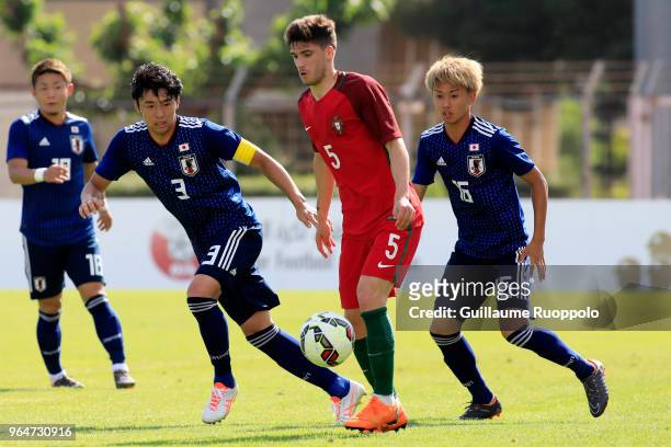 Yuta Nakayama of Japan and Ruben Vinagre of Portugal during U20 match between Portugal and Japan of the International Football Festival tournament of...