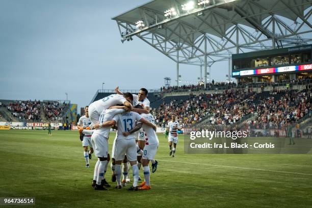 Teammates help Josh Sargent of the Men's National Team celebrate his 1st national team goal during the International Friendly Match between United...