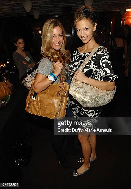 Personality Rebecca Cardon and Marnette Patterson pose with Ada bags at the Hollywood Helping Haiti Golden Globes Celebrity & Charity Lounge at House...