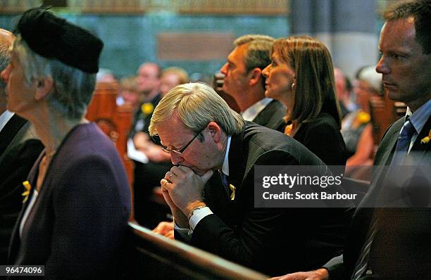 Australian Prime Minister Kevin Rudd looks down as he attends the Victorian Bushfires Remembrance Service at St. Paul's Cathedral on the one year...