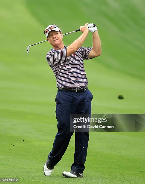 Tom Watson of the USA plays his second shot to the 9th hole during the second round of the 2010 Omega Dubai Desert Classic on the Majilis Course at...