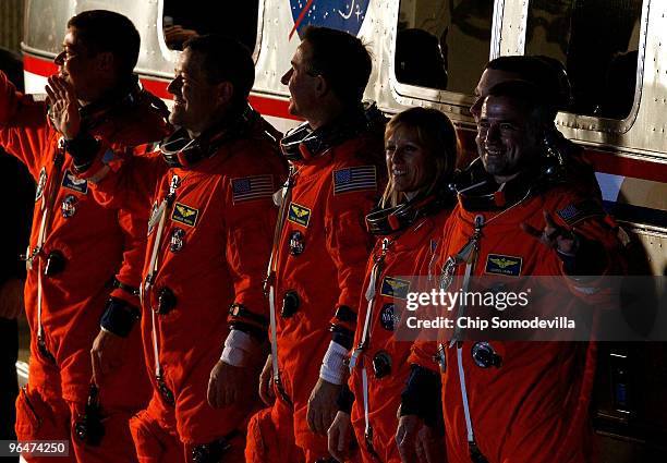 Space Shuttle Endeavour astronauts mission specialists Robert Behnken, Nicholas Patrick, Stephen Robinson, and Kathryn Hire, with pilot Terry Virts...