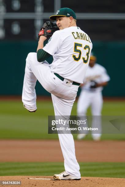 Trevor Cahill of the Oakland Athletics pitches against the Seattle Mariners during the first inning at the Oakland Coliseum on May 22, 2018 in...