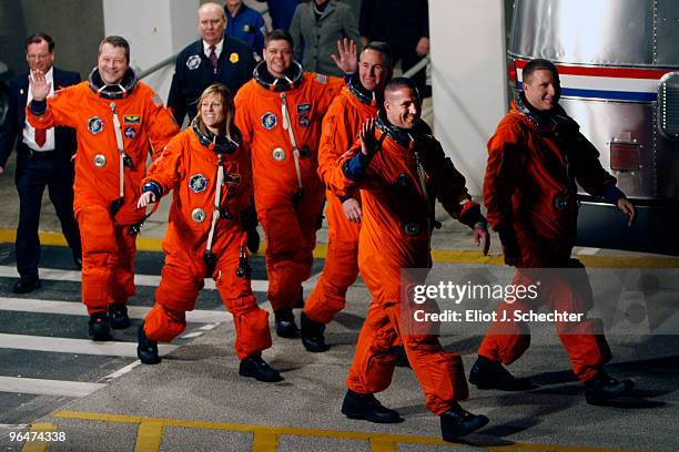 Space Shuttle Endeavour astronauts mission specialists Robert Behnken, Nicholas Patrick, Stephen Robinson, and Kathryn Hire, with pilot Terry Virts...