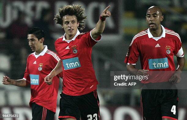 Benfica's David Luiz celebrates with unidentified teammates after scoring against Setubal during their Portuguese league football match at Bonfim...