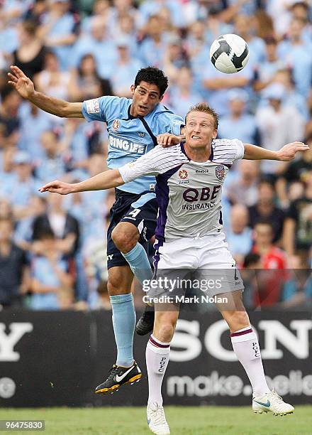 Simon Colosimo of Sydney and Daniel McBreen of Perth contest possession during the round 26 A-League match between Sydney FC and the Perth Glory at...