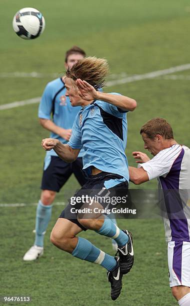 Justin Hayward of Sydney heads the ball during the round 23 National Youth League match between Sydney FC and the Perth Glory at Seymour Shaw Park at...