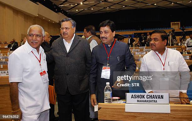 India's Karnataka state Chief Minister B.S. Yedurappa, Chattisgarh Raman Singh, Maharashtra CM Ashok Chavan and Maharashtra Deputy CM R.R. Patil chat...