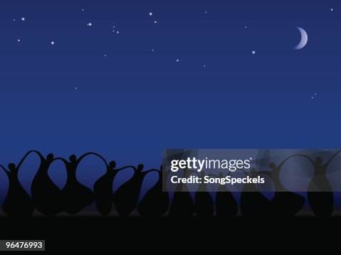 Women with arms raised in joy by Moonlight Women with arms raised in joy by Moonlight