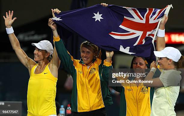 The Australian team of Rennae Stubbs, Alicia Molik, Casey Dellacqua and Sam Stosur celebrate winning their 2010 Fed Cup World Group II tie between...
