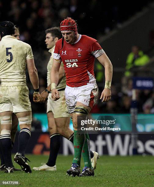 Alun Wyn Jones of Wales walks off after being shown the yellow card during the RBS 6 Nations Championship match between England and Wales at...