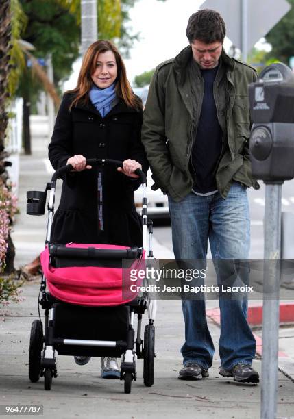 Alyson Hannigan and Alexis Denisof are seen on February 6, 2010 in Los Angeles, California.
