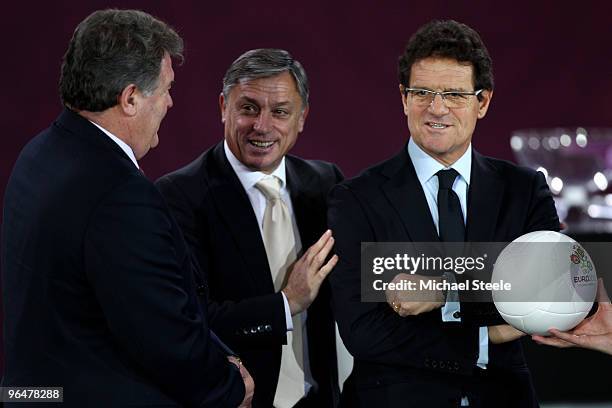 John Toshack coach of Wales, Zlatko Kranjcar coach of Montenegro and Fabio Capello coach of England pose alongside each other after being drawn...