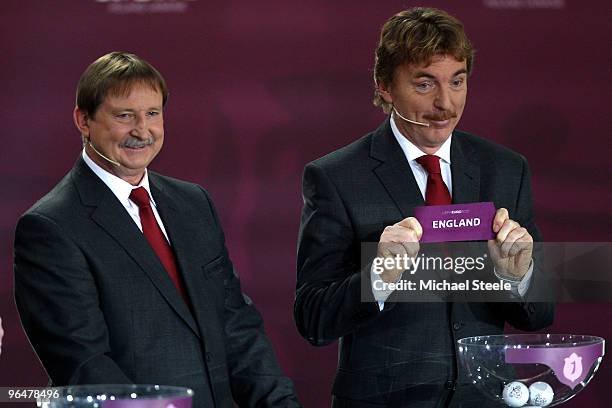 Zbigniew Boniek draws England into Group G alongside Andrzej Szarmach during the Euro2012 Qualifying Draw at the Palace of Culture and Science on...