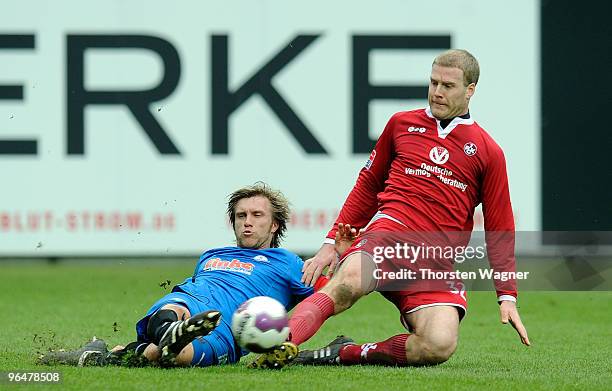 Adam Nemec of Kaiserslautern battles for the ball with Markus Kroesche of Paderborn during the Second Bundesliga match between 1.FC Kaiserslautern...