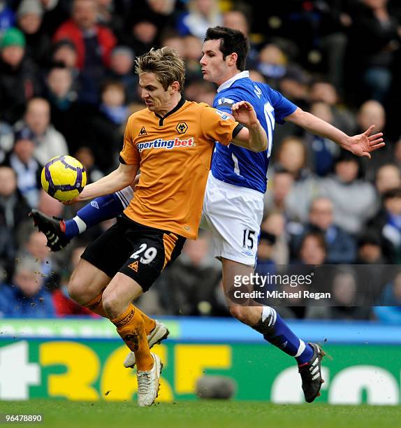 Kevin Doyle of Wolverhampton battles with Scott Dann of Birmingham during the Barclays Premier League match between Birmingham City and Wolverhampton...