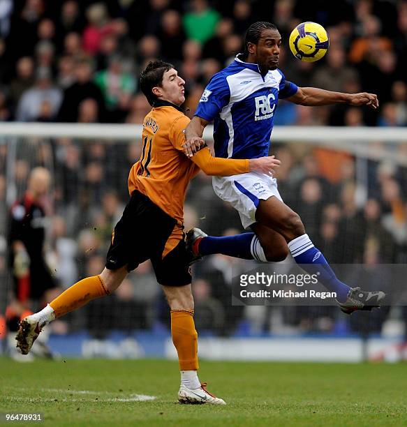 Stephen Ward of Wolverhampton battles with Cameron Jerome of Birmingham during the Barclays Premier League match between Birmingham City and...