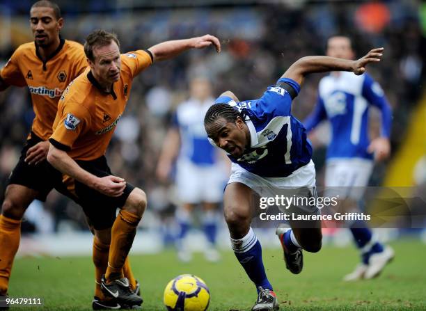 Jody Craddock of Wolves tackles Cameron Jerome of Birmangham during the Barclays Premier League match between Birmingham City and Wolverhampton...