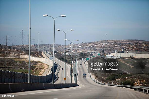 Vehicles drive on route 443, a main road on which Palestinian traffic is forbidden, linking central Israel with Jerusalem as Israel's separation...