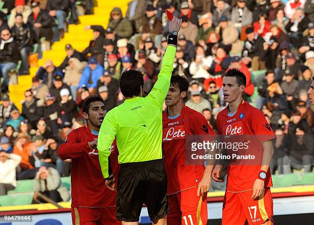 The referee Antonio Damato a red card to Christian Maggio of Napoli during the Serie A match between Udinese and Napoli at Stadio Friuli on February...