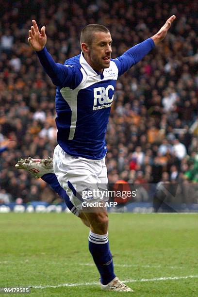 Birmingham City's English player Kevin Phillips celebrates scoring his second goal against Wolverhampton Wanderers during their English Premier...