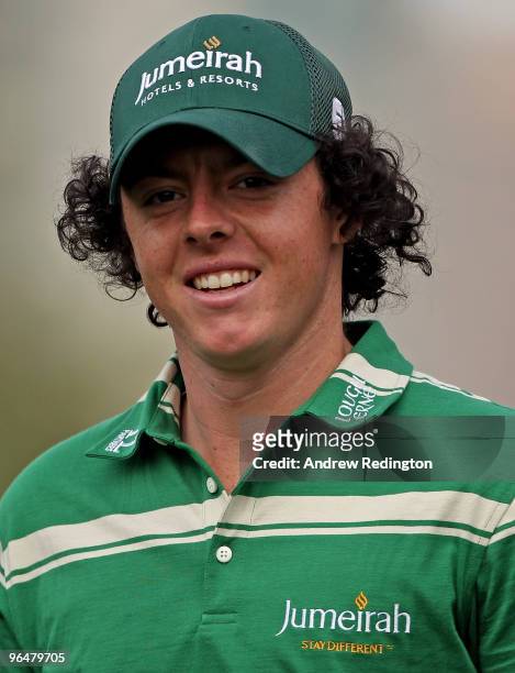Rory McIlroy of Northern Ireland smiles on the fifth hole during the final round of the Omega Dubai Desert Classic on February 7, 2010 in Dubai,...