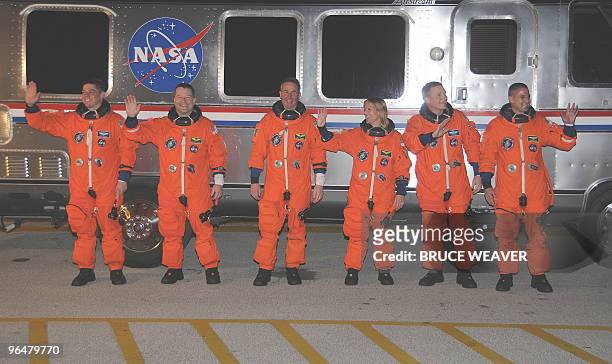 The US space shuttle Endeavour's crew leaves their quarters on February 07 2010 at Kennedy Space Center, Florida for the STS-130 mission to the...