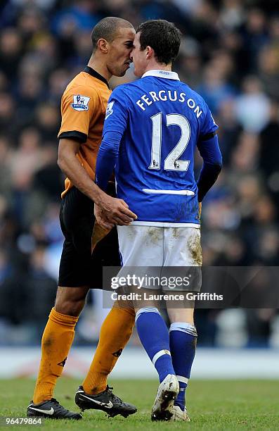 Barry Ferguson of Birmingham and Karl Henry of Wolves go toe to toe during the Barclays Premier League match between Birmingham City and...