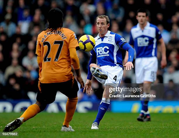 Michael Mancienne of Wolves battles with Lee Bowyer of Birmangham during the Barclays Premier League match between Birmingham City and Wolverhampton...