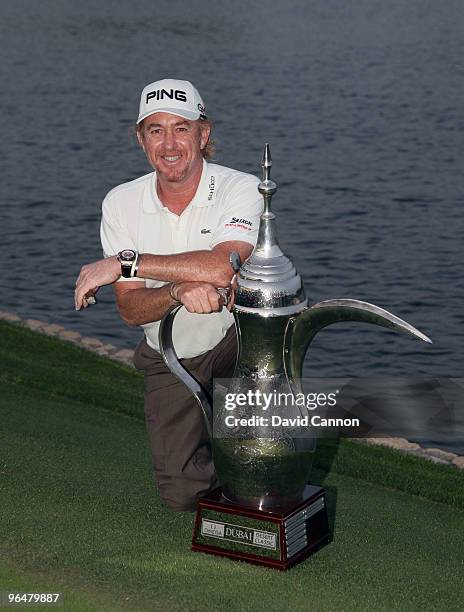 Miguel Angel Jimenez of Spain with the trophy after the final round of the 2010 Omega Dubai Desert Classic on the Majilis Course at the Emirates Golf...