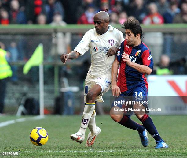 Giuseppe Sculli of Genoa CFC battles for the ball against Siqueira De Oliveira Luciano of AC Chievo Verona during the Serie A match between Genoa CFC...