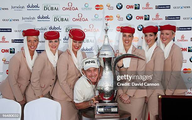 Miguel Angel Jimenez of Spain with the trophy after the final round of the 2010 Omega Dubai Desert Classic on the Majilis Course at the Emirates Golf...