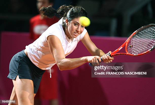 Christina McHale returns the ball to French Pauline Parmentier during the Fed Cup tennis tournament match opposing France to the USA on February 7,...