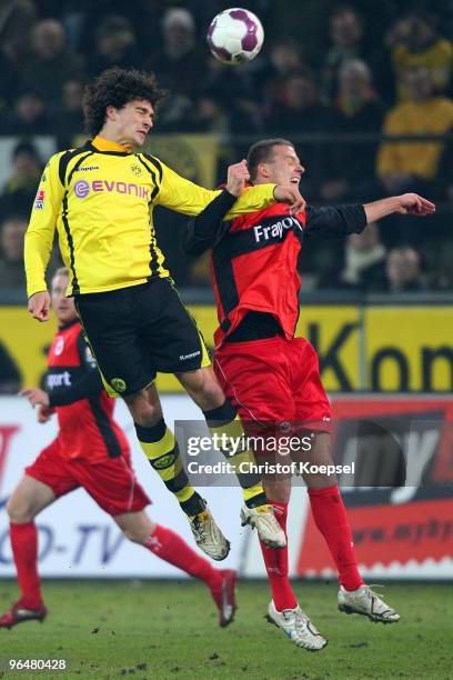 Mats Hummels of Dortmund and Alexander Meier of Frankfurt go up for a header during the Bundesliga match between Borussia Dortmund and Eintracht...