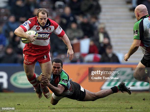 James Simpson-Daniel of Gloucester is tackled during the LV Anglo Welsh Cup match between Harlequins and Gloucester at The Stoop on February 7, 2010...