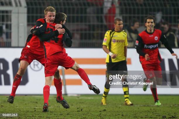 Sebastian Jung of Frankfurt celebrates the second goal with Maik Franz during the Bundesliga match between Borussia Dortmund and Eintracht Frankfurt...