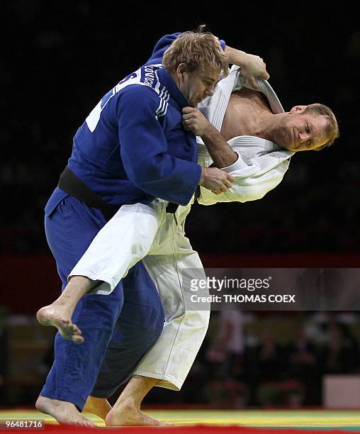 Belgium Elco Van Der Geest competes with Russian Sergey Samoylovich during their men final round fight in the under 100kg category, at the Paris judo...