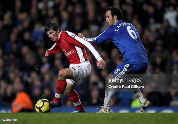 Ricardo Carvalho of Chelsea is beaten by Andrei Arshavin of Arsenal during the Barclays Premier League match between Chelsea and Arsenal at Stamford...
