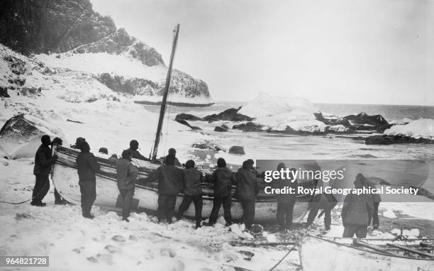 Launching the 'James Caird', Elephant Island, Launching the Caird. "Shackleton and five others setting out for relief to South Georgia.", Antarctica,...