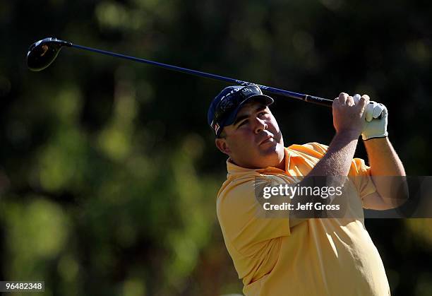 Kevin Stadler hits a tee shot on the second hole during the final round of the Northern Trust Open at Riviera Country Club on February 7, 2010 in...