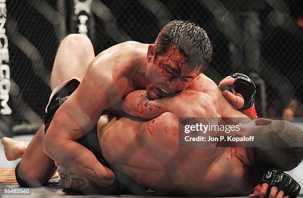 Fighter Chael Sonnen battles UFC fighter Nate Marquardt during their Middleweight fight at UFC 109: Relentless at Mandalay Bay Events Center on...